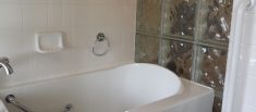 Walk-In Tub Against Brick Glass
